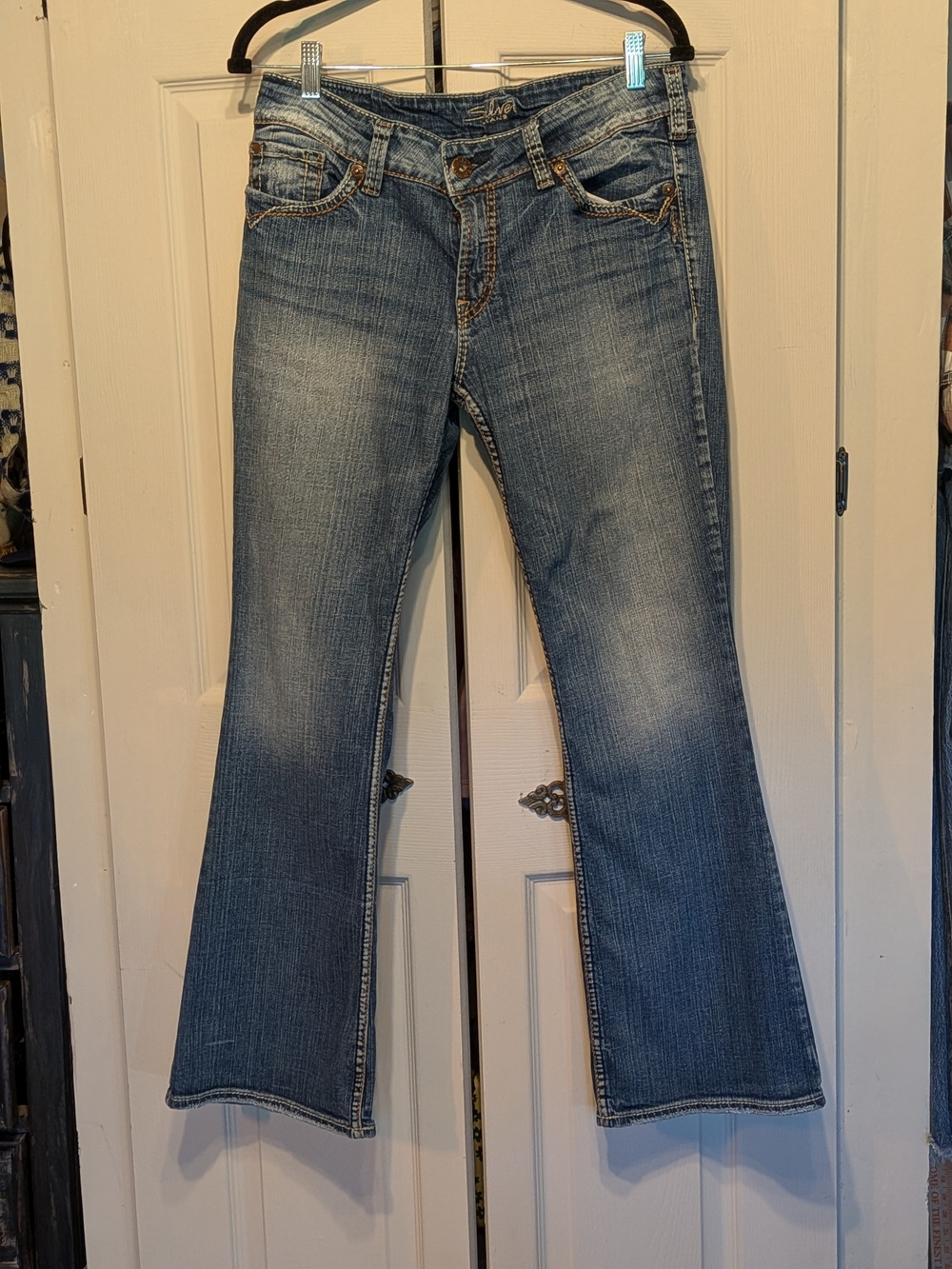 Silver Jeans Women's Medium Blue Flare Jeans with Whiskering